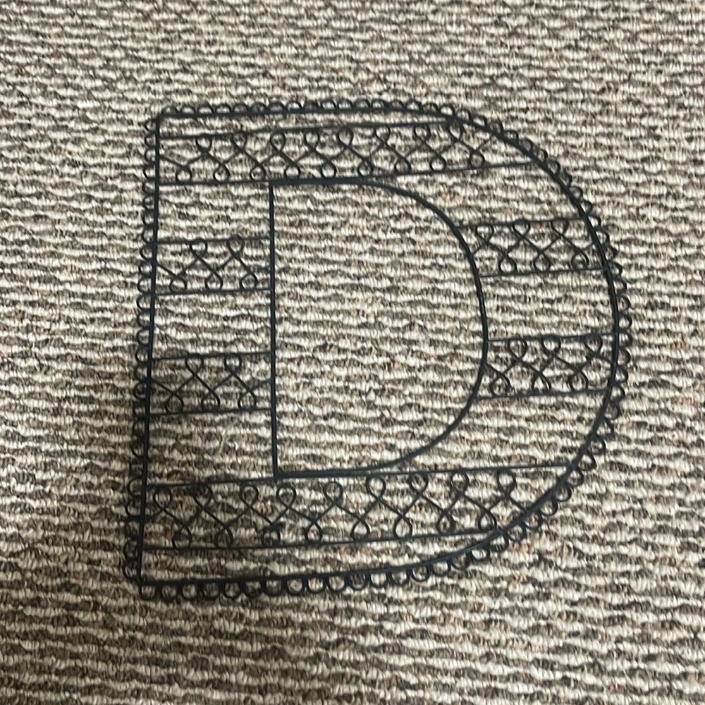Metal letter D